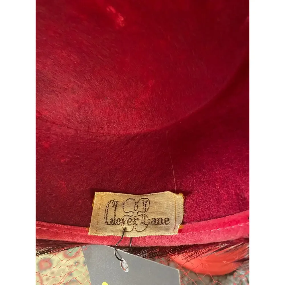 vintage 1960s maroon feather pillbox hat, 60s fashion, bird millinery, net veil